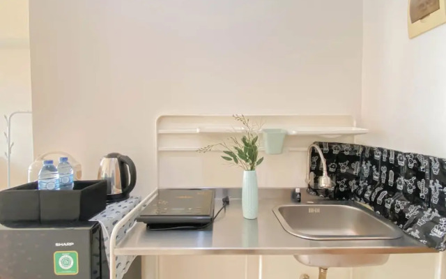Cozy and Tranquil Studio at Podomoro Golf View Apartment