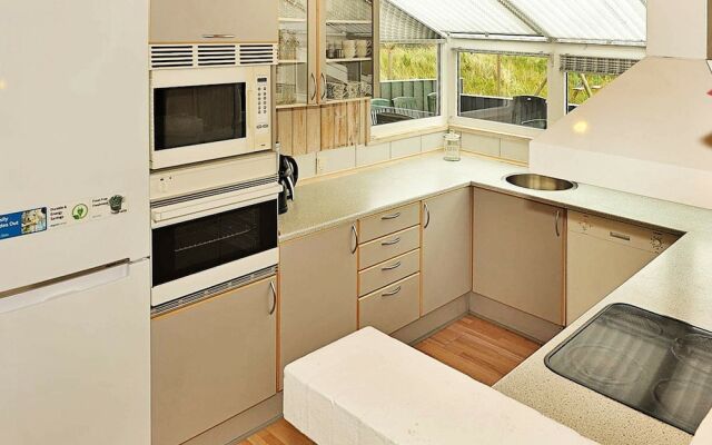 Trendy Holiday Home in Henne With Sauna