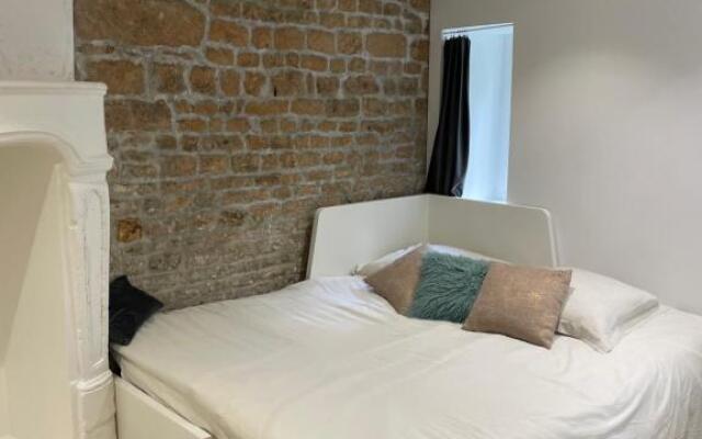 Superbe appartement avec accès patio