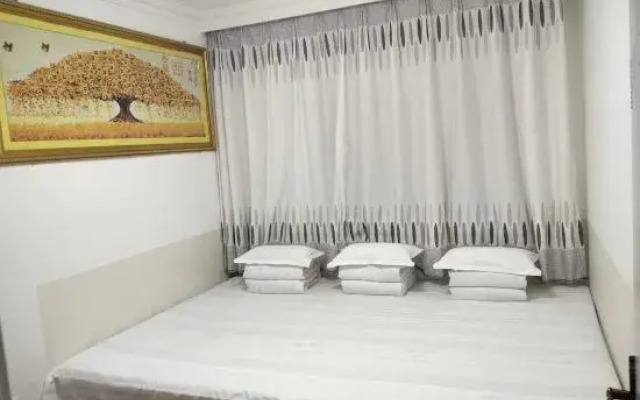 Benxi Huamu Hefu Warm Apartment