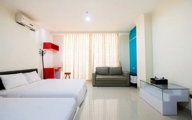 Family Studio Room at Ancol Mansion Apartment By Travelio