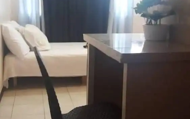 Ekonumi Rooms at Benrosi Plaza