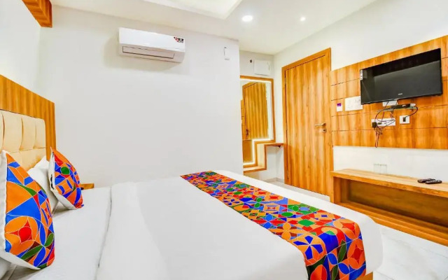 Fabhotel Prime Purple Orchid