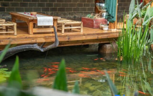 Puzhehei Yidu Homestay (Hehua Daguan Garden)