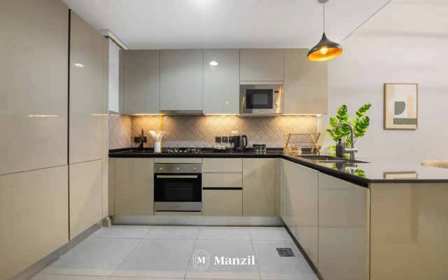 Manzil-Stylish 1BR with Maid room in JVC