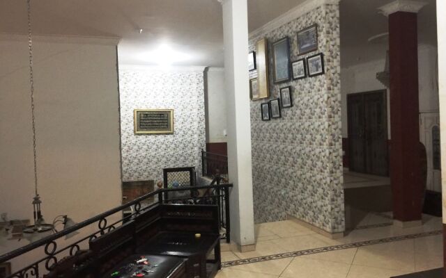 Hotel O Guest House Bu Iin Syariah