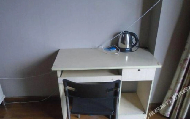 Qingqing Wojia Hotel Style Apartment