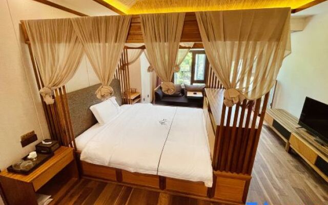 Xishuangbanna Jinghong Yakatu Theme Inn (Mengle Dafo Temple)