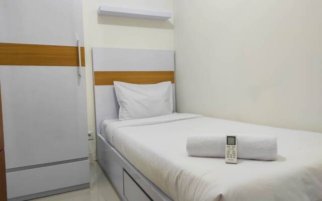 Homey and Comfy 2BR at Vida View Apartment