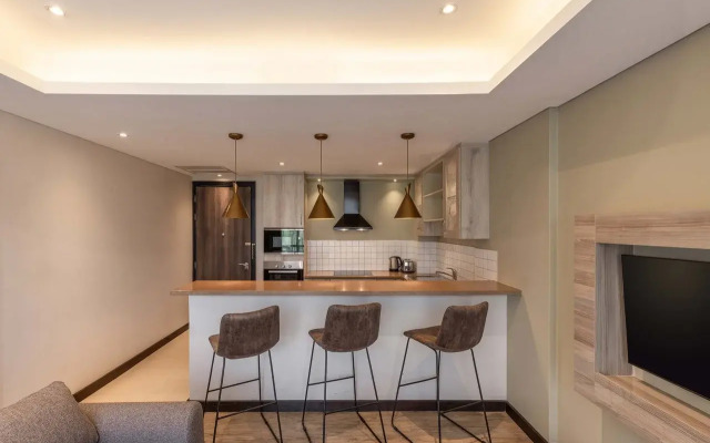 Trademark Suites at Enaki Town