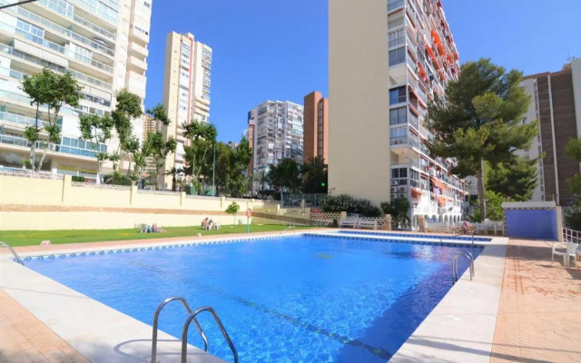 Apartamento con piscina y garaje, Playa a 10 min