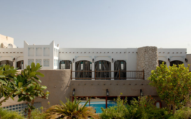 Al Liwan Suites