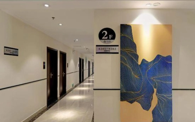 Xingyi Chain Hotel Jiangxia Metro Station