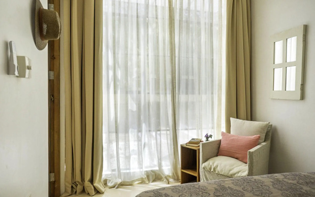 Calalily Aldea Zama by Homing Bird