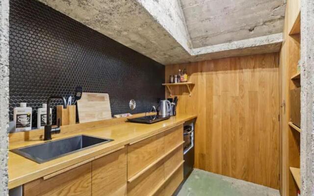 Unique Industrial-Style Apartment in Auckland