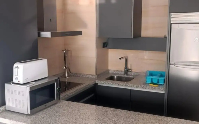 Belvilla by OYO Apartamento con Patio