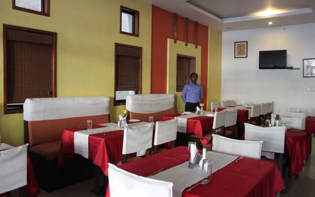 FabHotel Srujana Inn