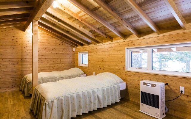 Cottage In Log Cabin