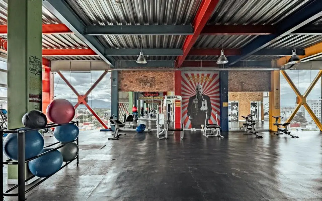 Bed in mixed room near Coyoacan
