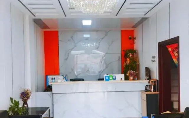 Zhoukou Kaixinyuan Hotel (Baicheng Railway Station)