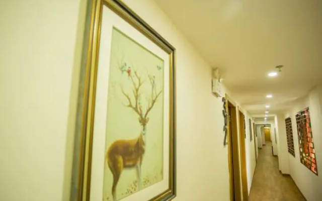Haikou Xiehou Boutique Homestay (Bell Tower Qilou Old Street Branch) – Hotel Rooms – Haikou