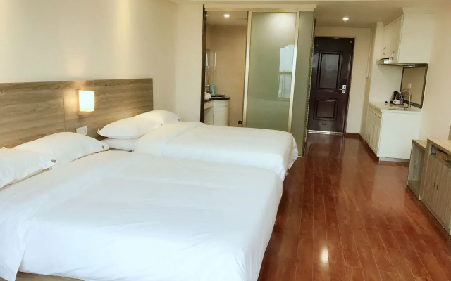 Xingyue Apartment Luogang Wanda