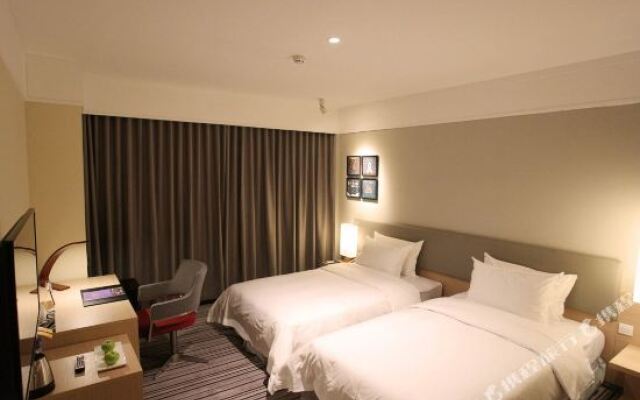 Xin Cai Zi Business Hotel