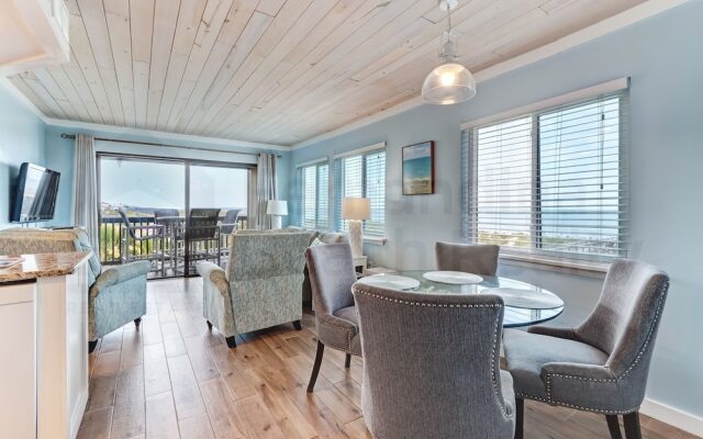 Newly Remodeled Oceanfront Condo with Salt Water Pool and Private Walkway to Beach by RedAwning