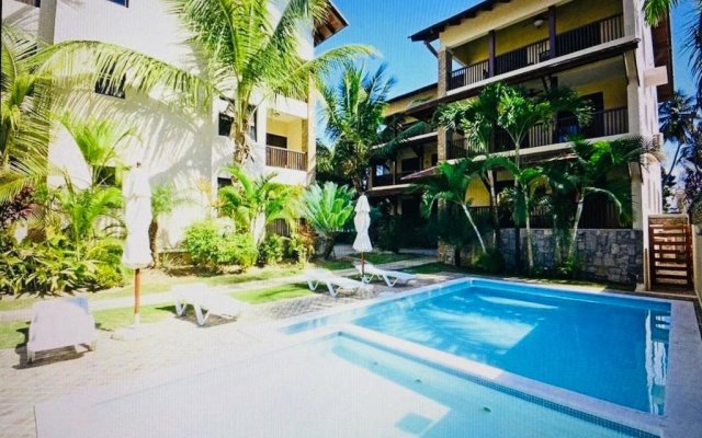 Lovely Beachfront 2 bedrooms condo with 2 pools