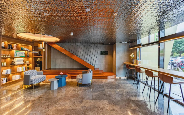 Ginza Jiayue Select Hotel (Qihe Wanda Plaza Spring City Oulebao)