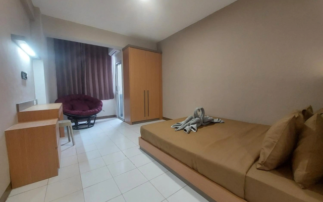 Emerald Apartel
