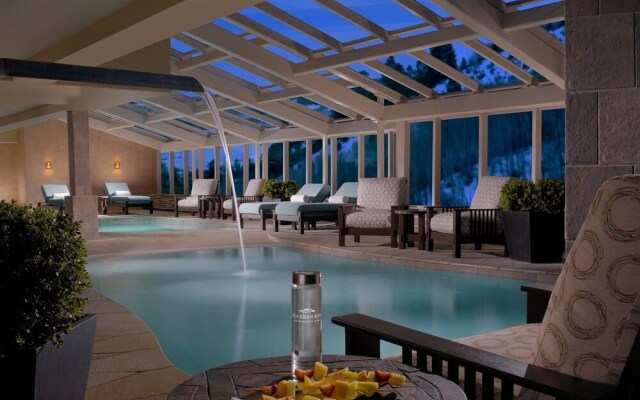 Expansive 4 Bedroom Ski in, Ski out One Ski Hill Residence Located at the Base of Peak 8 with Beautiful Views