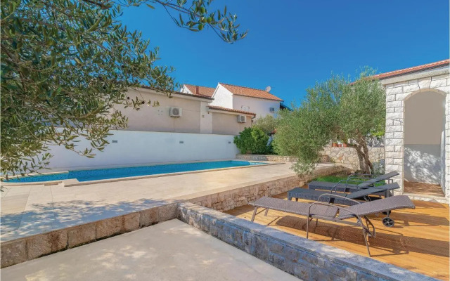 Two-Bedroom Holiday home Jezera with a Fireplace 05