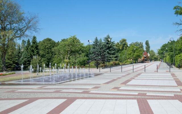 VacationClub - Willa Carmen Apartments