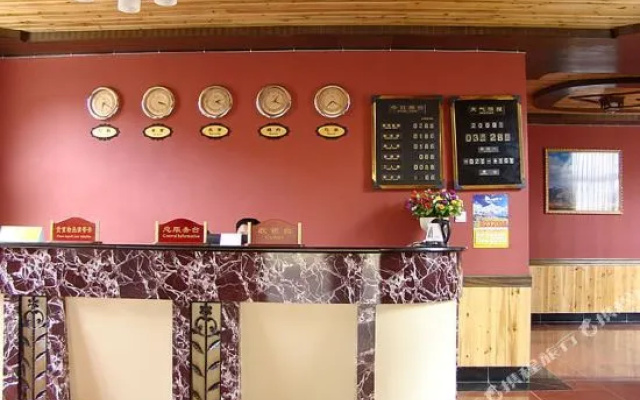 Kuaile Yijia Business Hotel