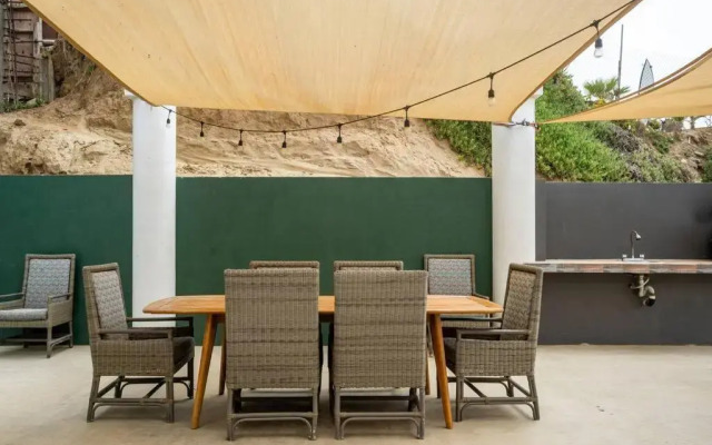 Triton's Playhouse Beachfront