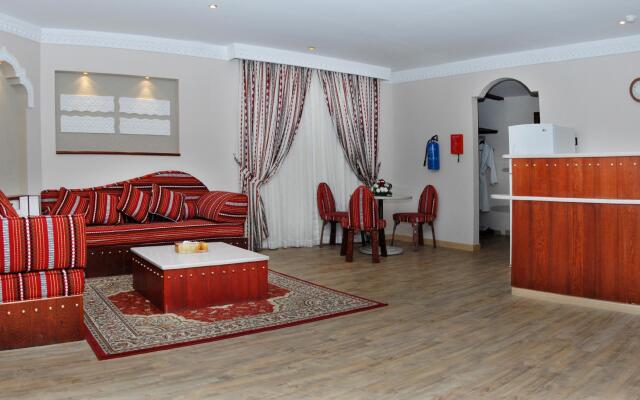 Al Liwan Suites