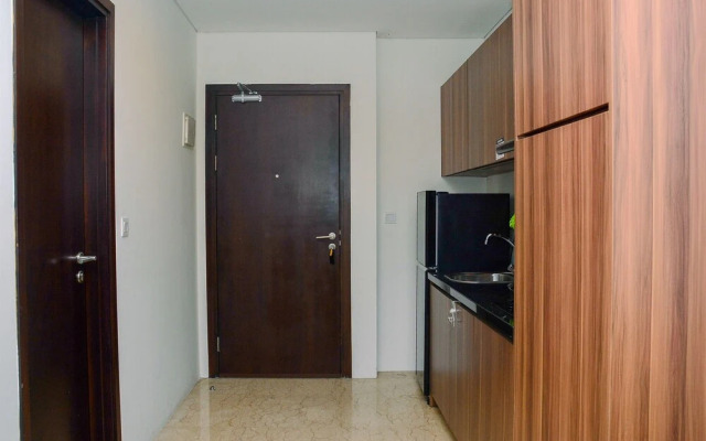 Elegant and Best View 1BR L'Avenue Apartment By Travelio