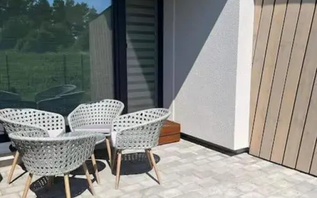 Modern & cozy studio with patio “Prie Juros”