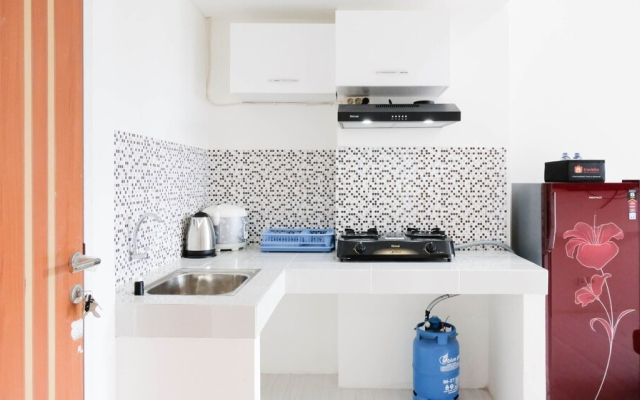 Homey And Cozy Living 2Br Apartment At Puncak Cbd