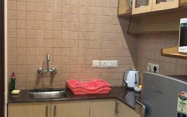 Enkay Suites - DLF CyberCity