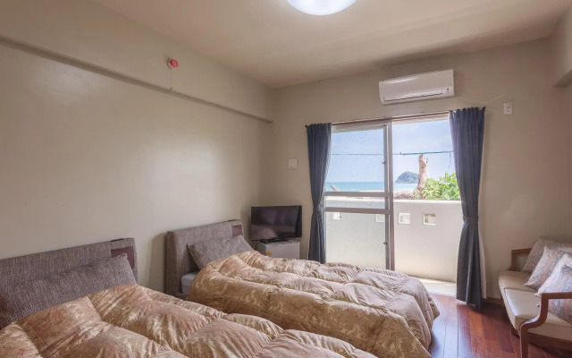 Condominium Uminchu No Yado