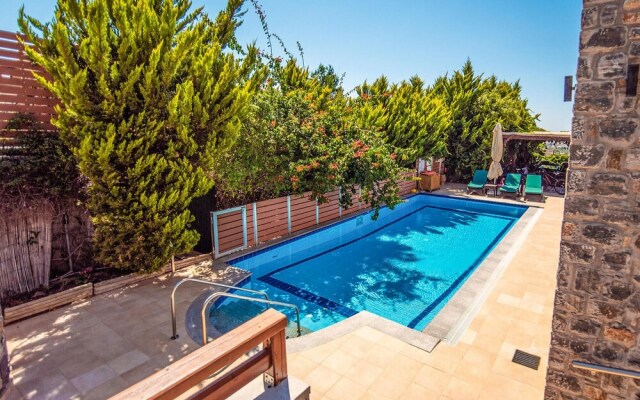 Amazing Home in Milatos with Hot Tub, Sauna & WiFi