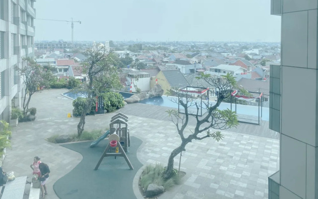 Homey and Restful Studio Grand Kamala Lagoon Apartment