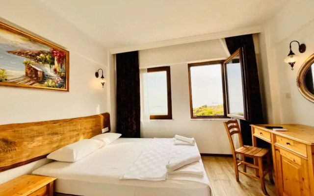 Sukha Inn Otel & Beach