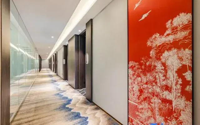 Rezen Dong Hotel (Tianjin Aoti Zhongxin Wangdingdi Subway Station)