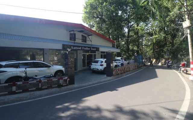 Aamod Feather Touch