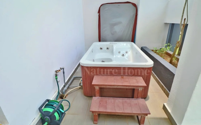 Swiss Garden Residences by Nature Home