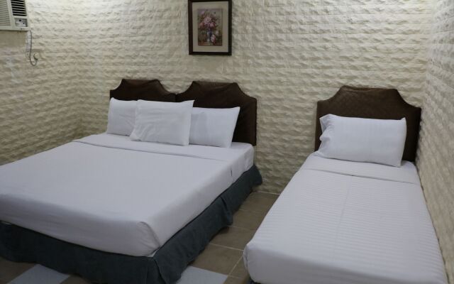 Al Alya Hotel Rooms and Suites