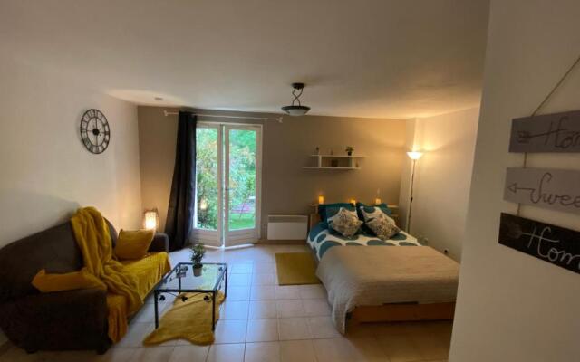 Appartement Cosy avec jardin privatif et garage